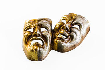 masks happy and sad photographed on white background