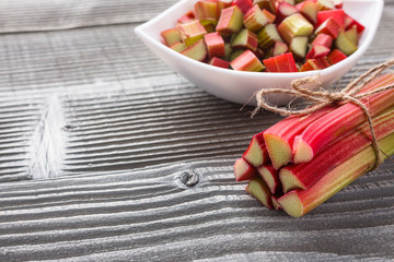 fresh rhubarb on a wooden rustic background
