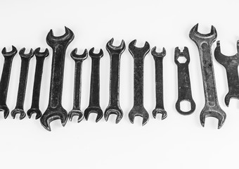 wrenches of different sizes on white background