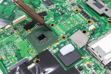 soldering iron is hand tool repairing electronic of the computer's circuit board by soldering Irons, concept technology of computer circuit hardware