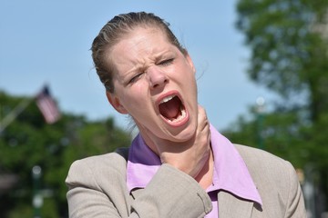 Business Woman Choking Wearing Suit