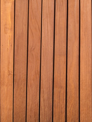 Wooden background, light texture of a wooden shield or a panel of aspen.