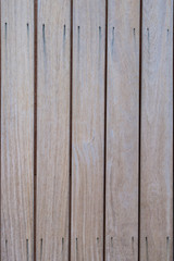 Wooden background, light texture of a wooden shield or a panel of aspen.