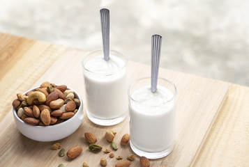 Yogurt in two glasses with dried fruit is a healthy breakfast.