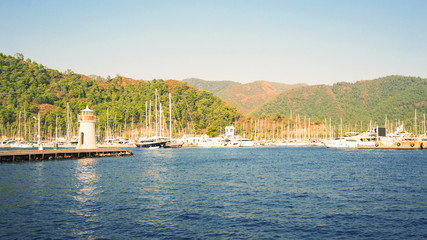 Naklejka premium Yachts docked in bay.