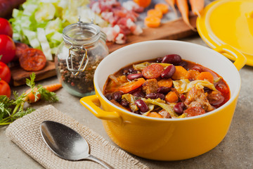 Traditional portuguese goulash with cabbage, beans and ribs.