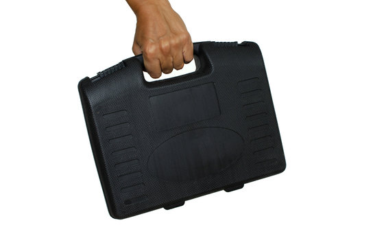 hand holds a black plastic case on a white background isolate