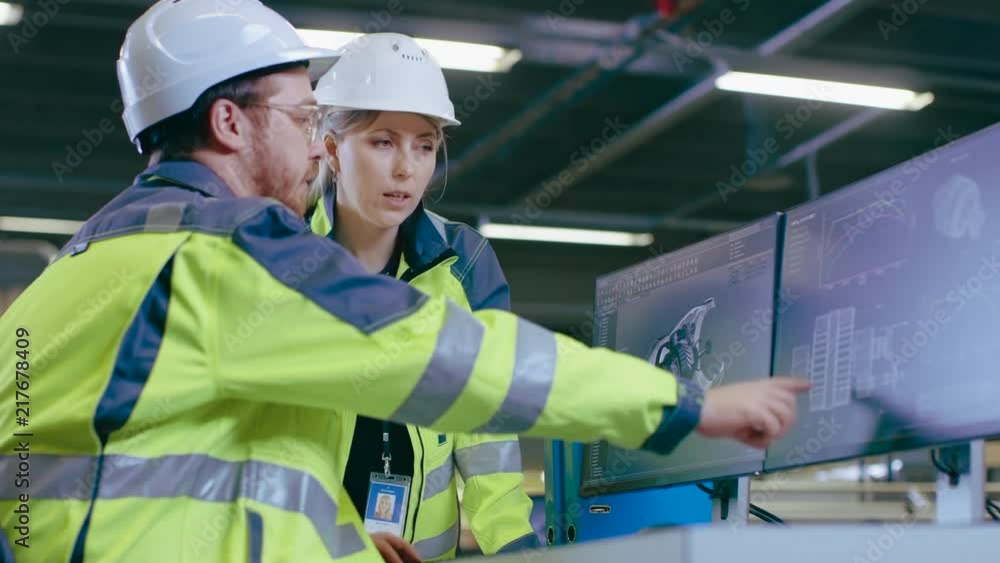 Poster inside factory male mechanical engineer and female chief engineer work together on the personal comp