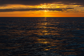 beautiful sunset on the sea hot summer.