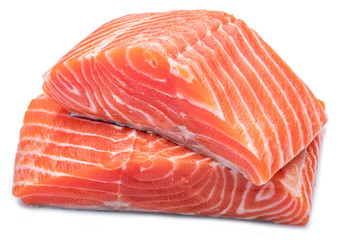 Fresh raw salmon fillets on white background.