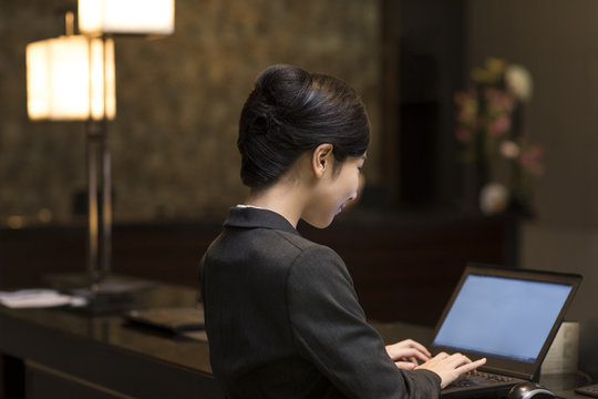 Cheerful hotel receptionist
