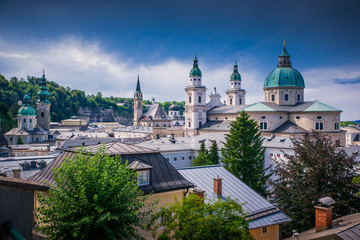 Fototapeta na wymiar Classic panoramic view of the historic city of Salzburg with famous Salzburg Cathedral in beautiful summer light