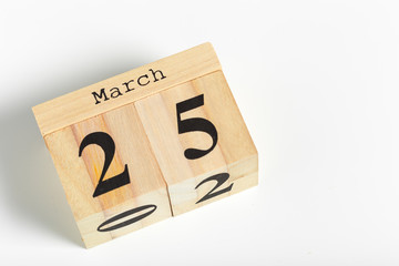 Wooden cubes with date on white background. 25th of March