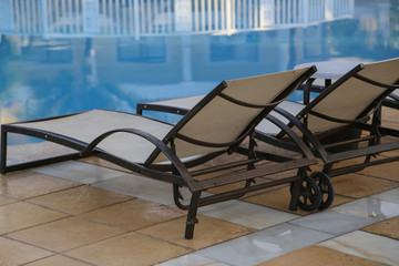 Sun beds at the edge of the pool