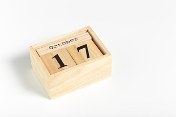 Wooden cubes with date on white background.17th of October