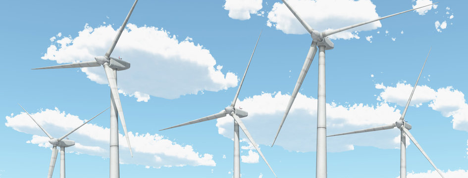 Wind turbines against a blue sky with clouds
