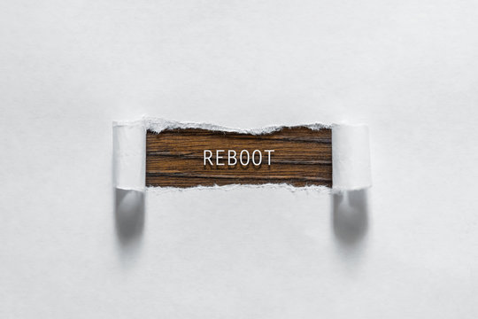 Reboot - An Inscription In The Torn White Paper. The Concept Of Rebooting, Restart.