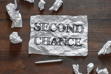 The inscription is a second chance, on a sheet of crumpled paper. The concept of the second...