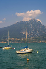 Fototapeta na wymiar Garda, Italy - July, 31, 2018: boats on Garda lake in Italy