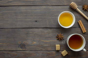 Ingredients autumn seasonal baking, cooking. Honey and coffee, brown sugar and spicy spices cinnamon and anise. Dark wooden background