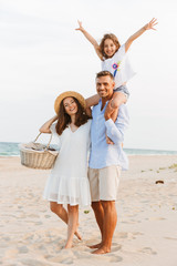 Cheerful family with father, mother, daughter