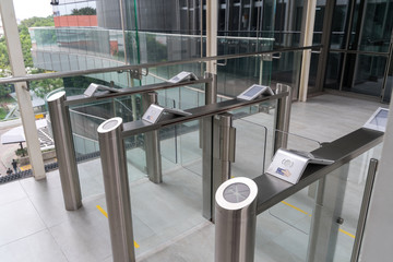 Fototapeta na wymiar security at an entrance gate with key card access control smart office building