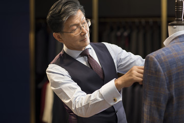 Confident fashion designer working