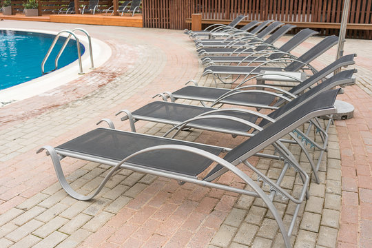 Sun beds at the edge of the pool