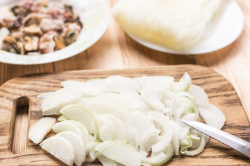 Sliced onions to prepare for cooking.