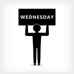 Man with a poster with an inscription Wednesday