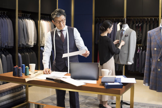 Confident fashion designer working