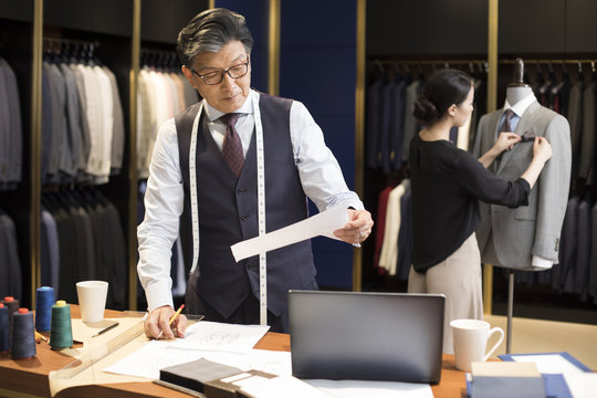 Confident fashion designer working