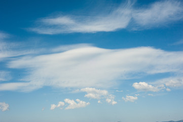 Beautiful white clouds in the blue sky as texture. Creative concept idea background.