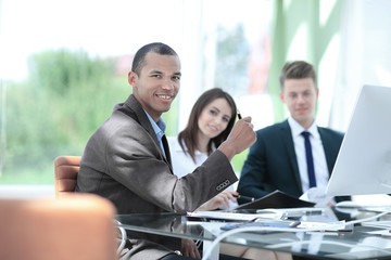 young Manager sitting in a modern office