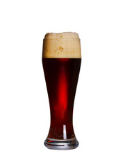 Glass of beer with cap of foam. Glass of ale isolated on white background