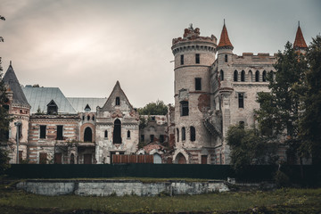 Fototapeta na wymiar Ruins of destroyed ancient castle of estate of Khrapovitsky in Muromtsevo, Russia