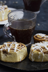 Cinnamon rolls on the white vintage plate