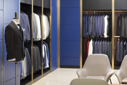Young couple shopping in a men's wear store