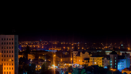 Obraz na płótnie Canvas Long exposure photo big city life at night. High view above the city.
