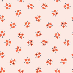 Fototapeta na wymiar Floral seamless pattern with red flowers on pink background. Repeated light backdrop, soft textile texture. Bright abstract nature wallpaper.