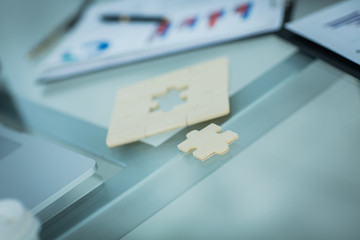 closeup.the puzzle on the Desk of a businessman.