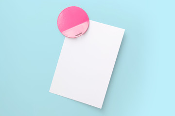 Empty paper sheet on the blue board. Note paper with pink magnetic.