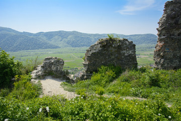 Ancient ruins of the castle of the town of Khust (Dracula Castle). a huge and powerful castle that...