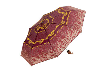 Open  umbrella with abstract red leopard elements isolated on white with clipping path