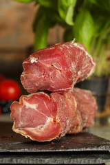 Fototapeta premium salami, sliced ​​slices (sausages) . food background. &nbsp;Top view with copy space