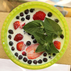 breakfast in the village berries with milk