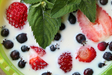 breakfast in the village berries with milk and mint