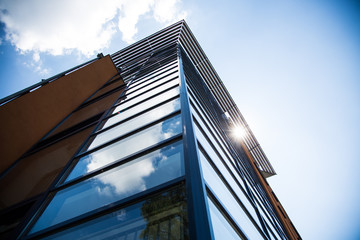 Residential building with glass facade, modern residential building in Munich
