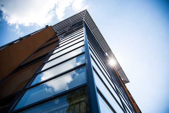 Residential building with glass facade, modern residential building in Munich