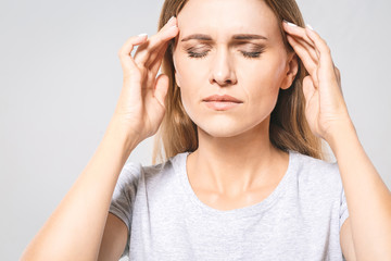 Health. Woman In Pain Feeling Bad And Sick, Having Headache And Fever, Holding Hand On Forehead. Beautiful Unhappy Tired Girl Suffering From Painful Head Ache And Stress. Healthcare. High Resolution